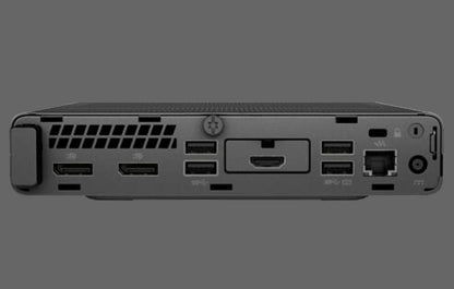 Back view of a black electronic device with ports on a white background